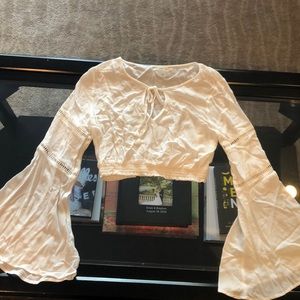 White bell sleeve crop top